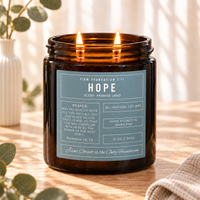 Hope prayer candle in a warm, sunlit setting