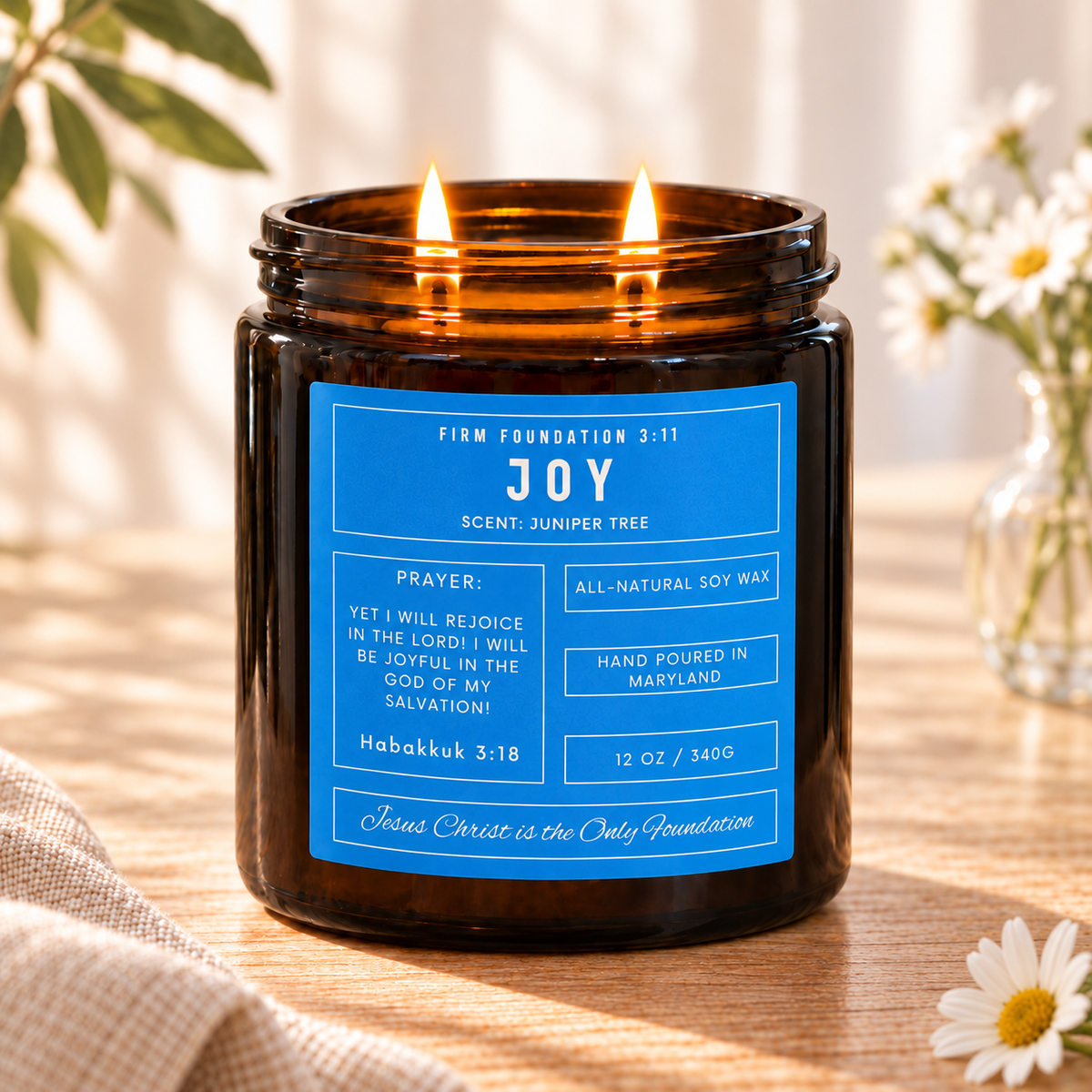 Joy prayer candle in a warm, sunlit setting