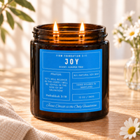 Joy prayer candle in a warm, sunlit setting