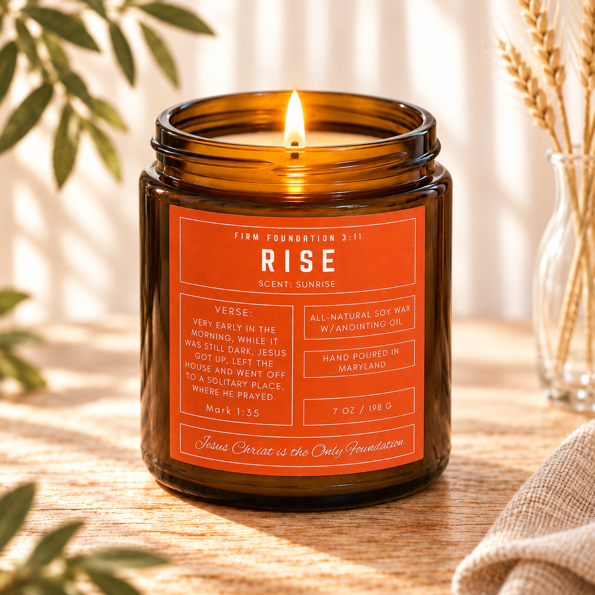 Rise prayer candle in a warm, sunlit setting