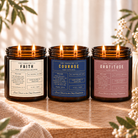 Trinity Collection prayer candle set in a warm, sunlit setting